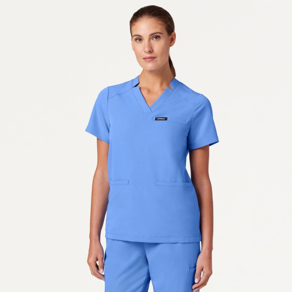 Jaanuu • Helia 3-Pocket Ceil Blue Scrub Top - M